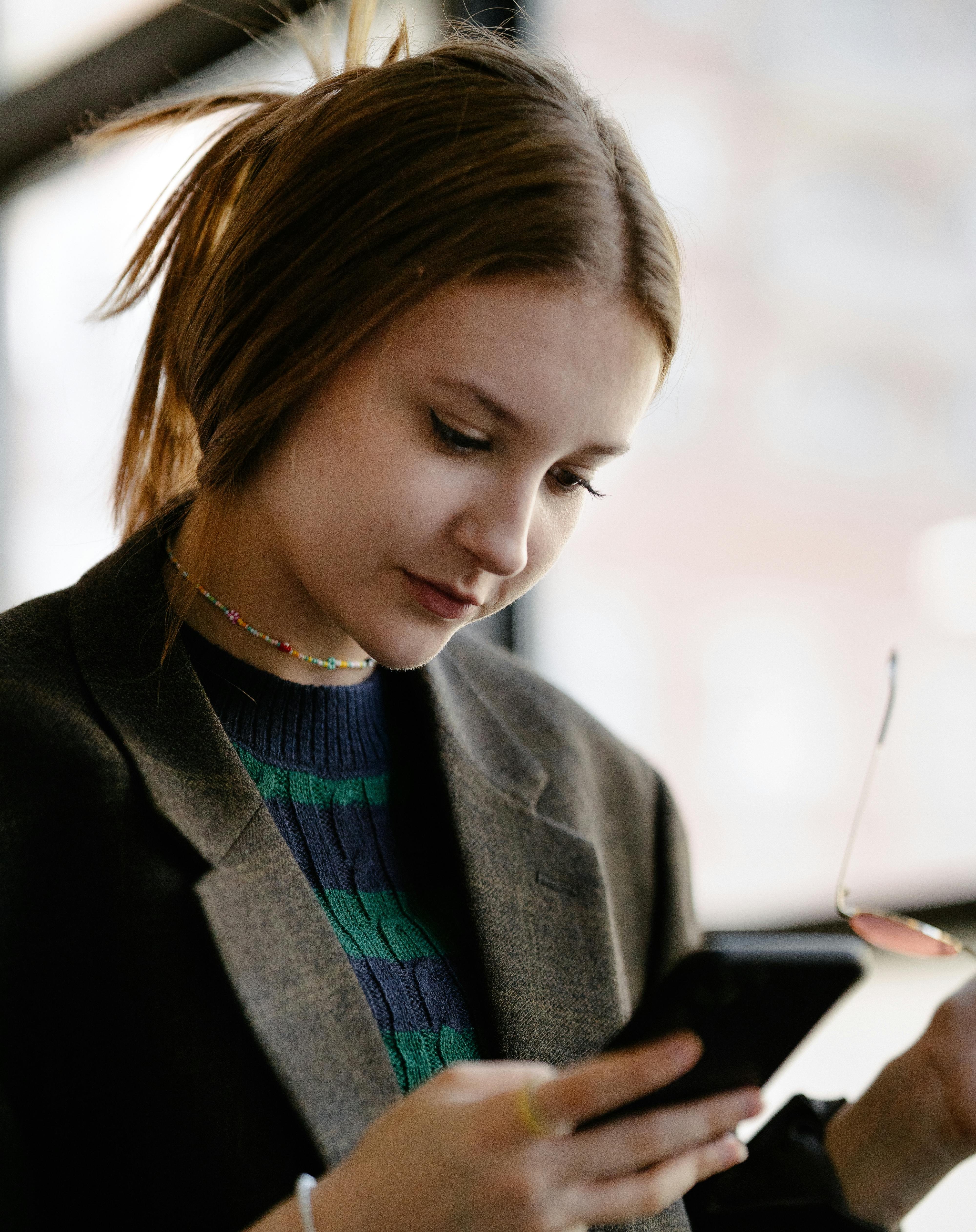 Person looking at phone privately